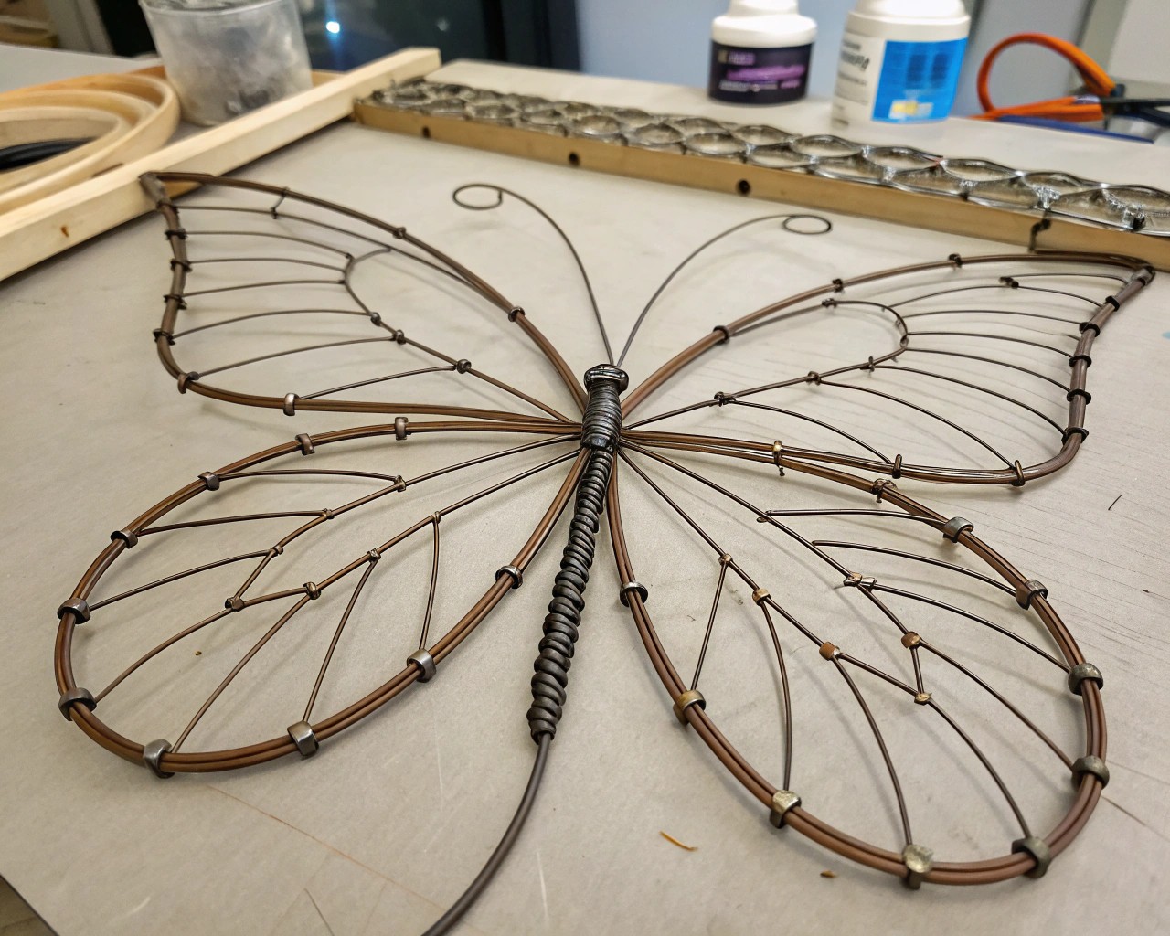 Learn how to skillfully construct a wire framework that forms the backbone of your wings.